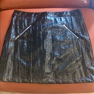 Never worn faux leather skirt with pockets